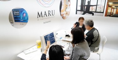 医療ツーリズム出展社のブース商談写真