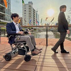 Nisshin Electronics Service Co.,Ltd Tracking type Electric Wheelchair "Go With"